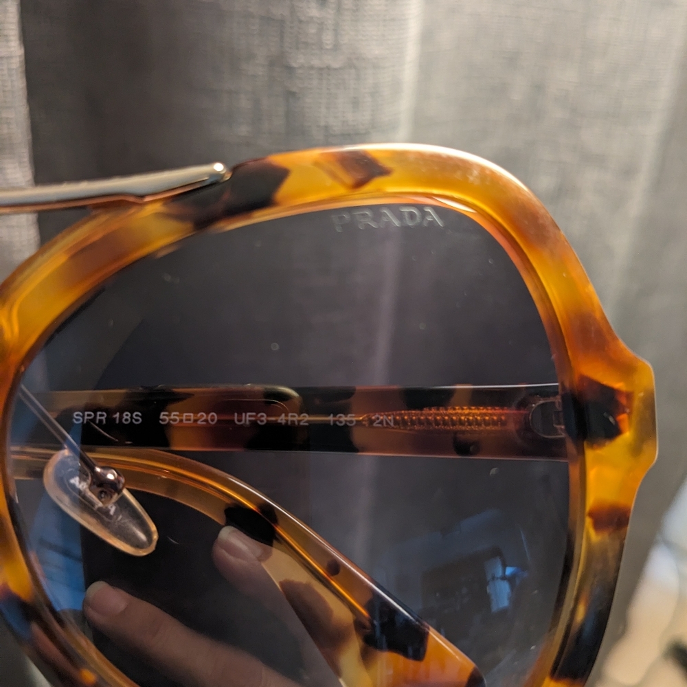Women's Prada tortoise shell color sunglasses